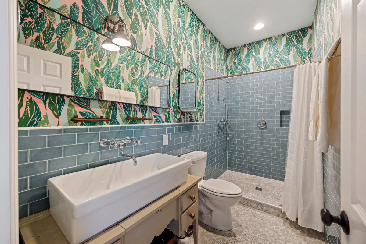 Breezy Palm, garden-print bath with walk-in shower